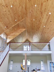 Custom knotty pine vaulted ceiling.